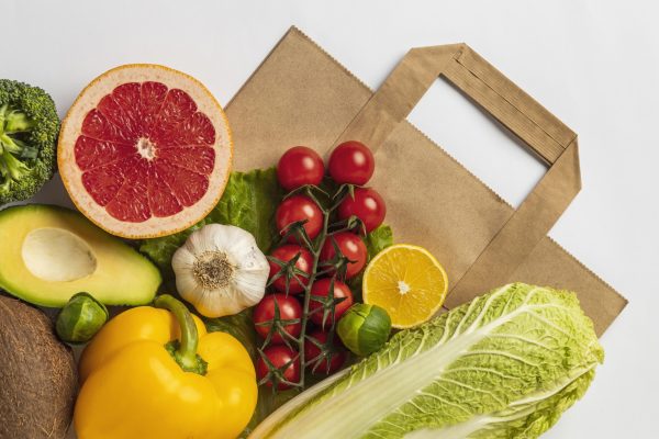 flat-lay-assortment-vegetables-with-paper-bag